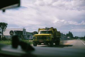 Old, poorly maintained semi-truck representing accident risk