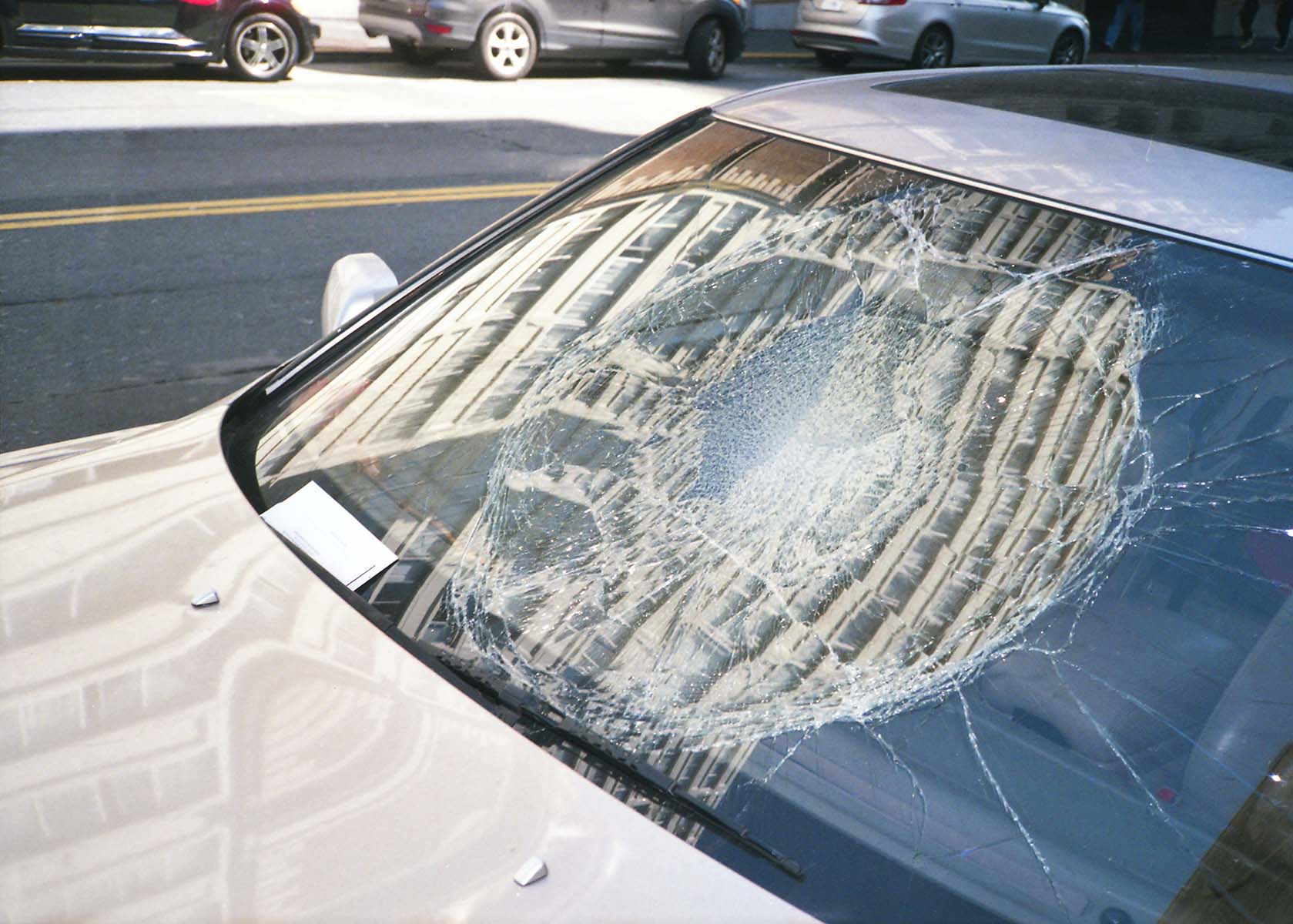 Shattered windshield after a serious car accident