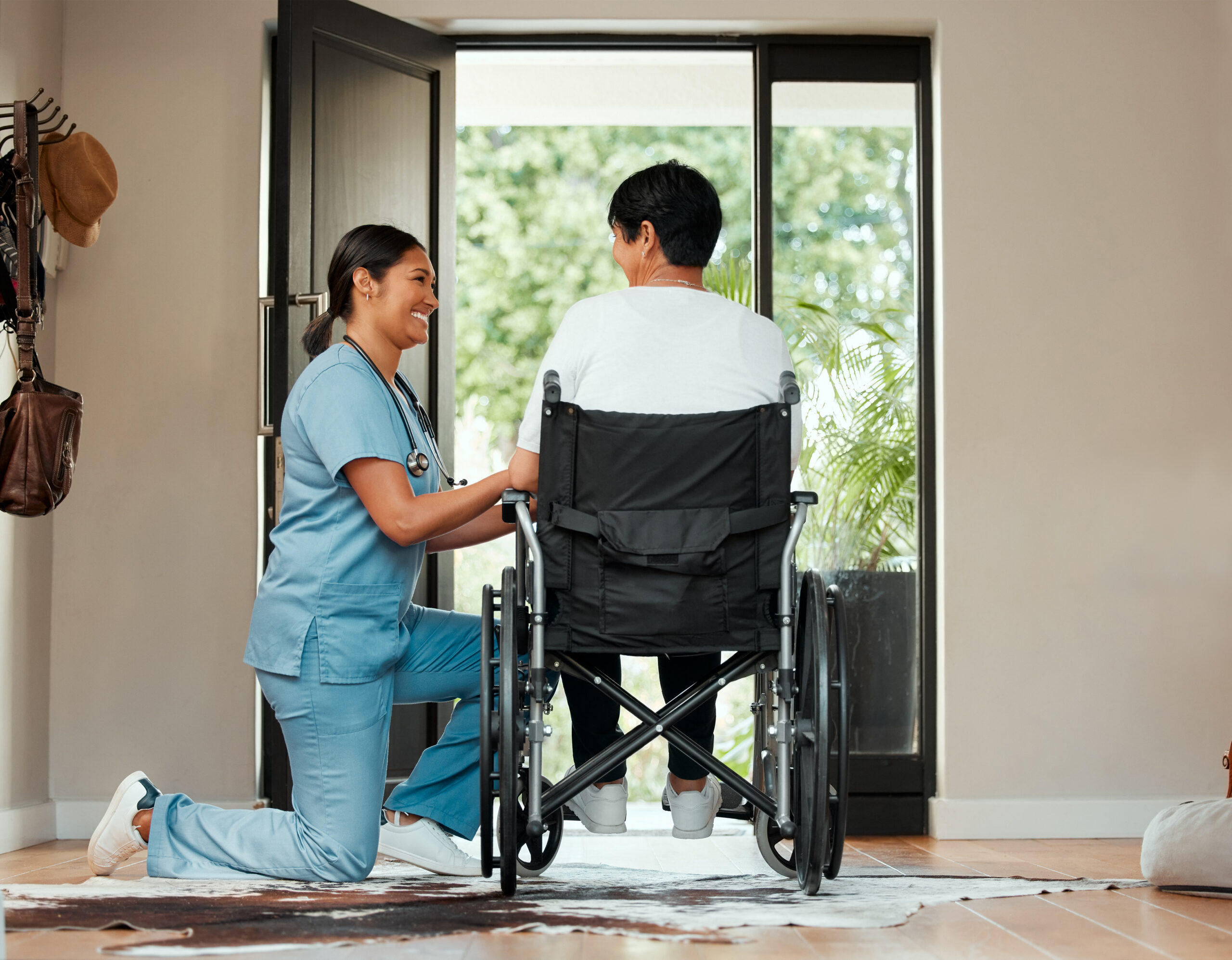 Catastrophic injury victim in wheelchair receiving caregiver support for daily living needs