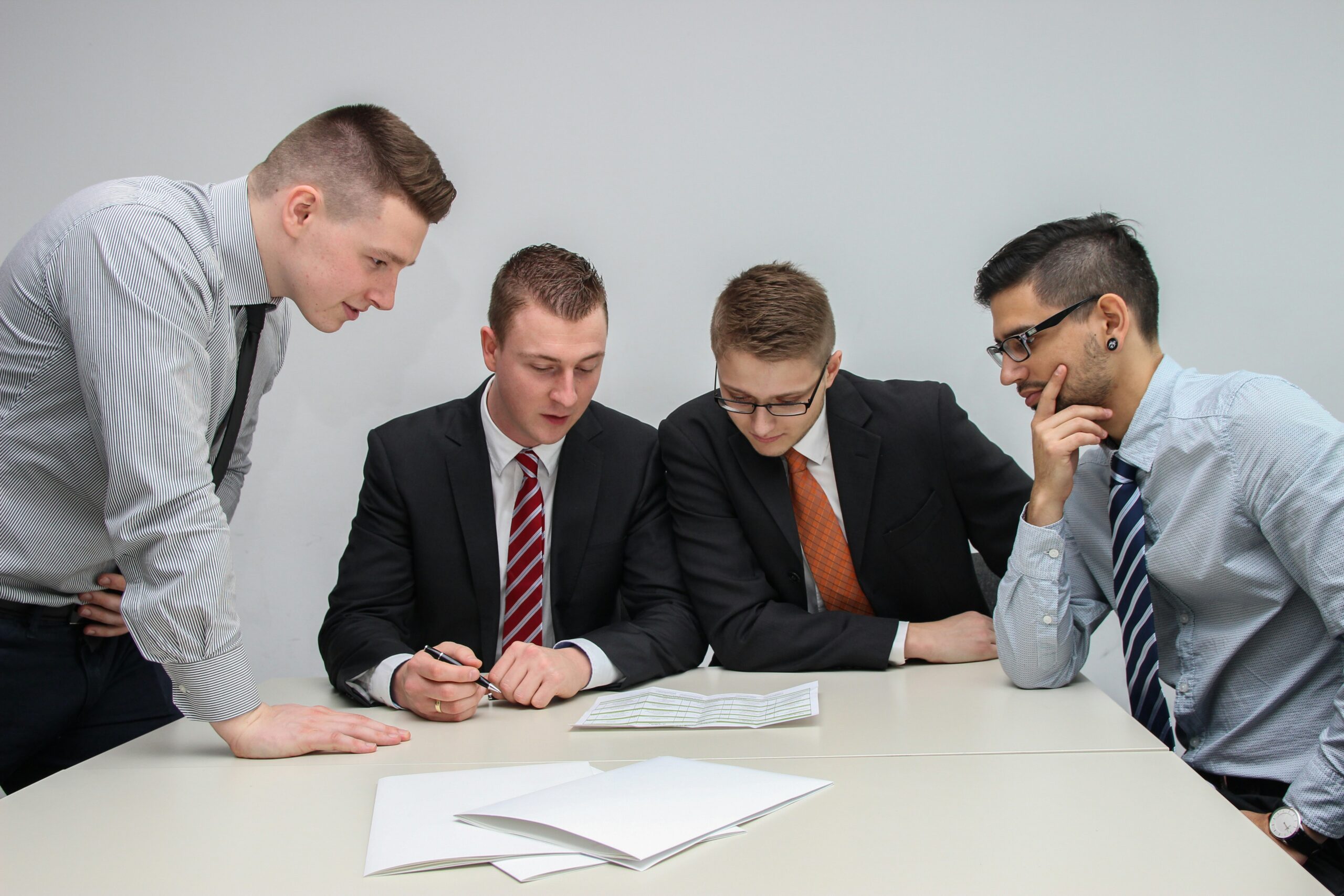 Legal professionals discussing paperwork