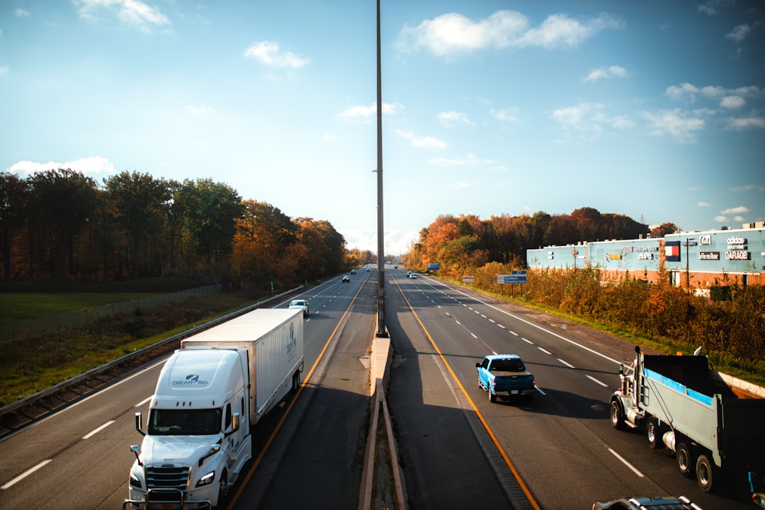 Semi-truck traveling on a multi-lane interstate highway in a truck accident article about Utah I-15
