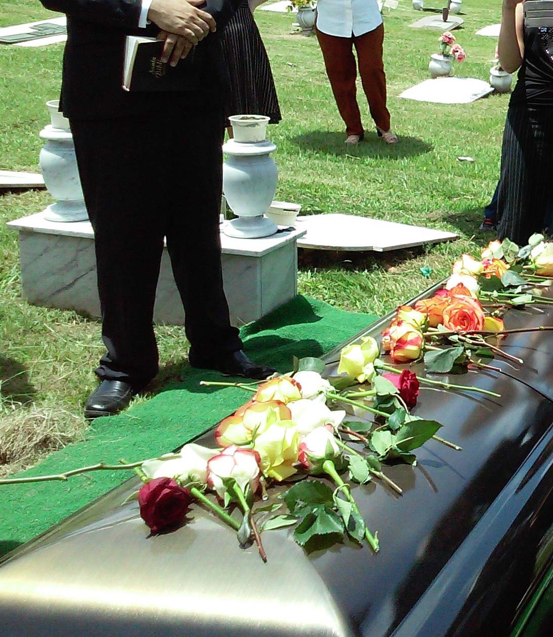 Funeral service with flowers representing a Tacoma wrongful death claim after a fatal accident.