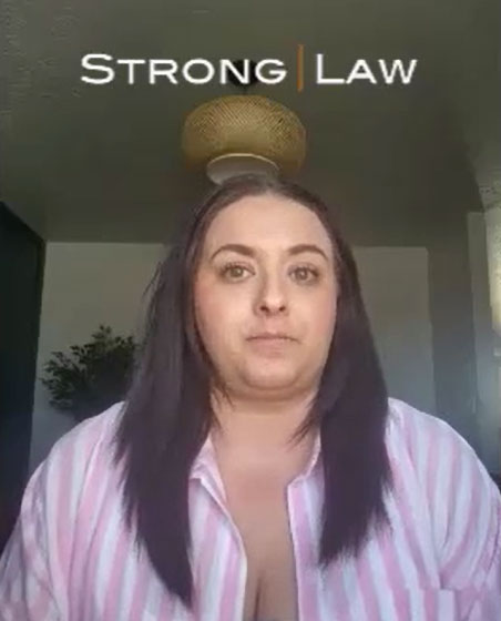 Strong Law client sharing her experience in a video testimonial